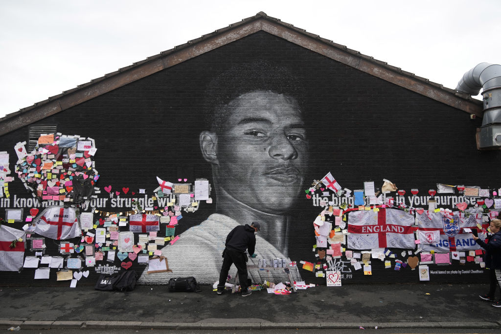 Defaced UK soccer star mural transformed into symbol of anti-racism